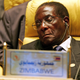 Zimbabwe's President Robert Gabriel Mugabe closes his eyes during the Africa Union meeting in Sirte, Libya July 4, 2005. Buoyed by a surge of global goodwill, Africa kept pressure on the rich world on Monday with its leaders readying a call for fairer trade and debt cancellation in the fight against poverty. A gathering of the 53-nation African Union (AU) in Libya which opened on Monday will agree a message to send to a summit of the Group of Eight (G8) rich nations in Scotland later this week about rescuing the continent of 800 million from poverty, war and disease.